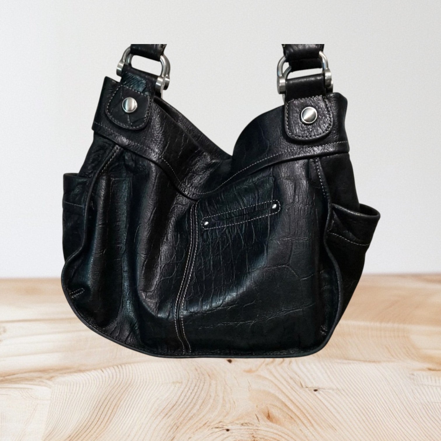 Marcia's Chic Boutique black crocodile-embossed faux leather hobo handbag with silver-tone hardware and shoulder strap.