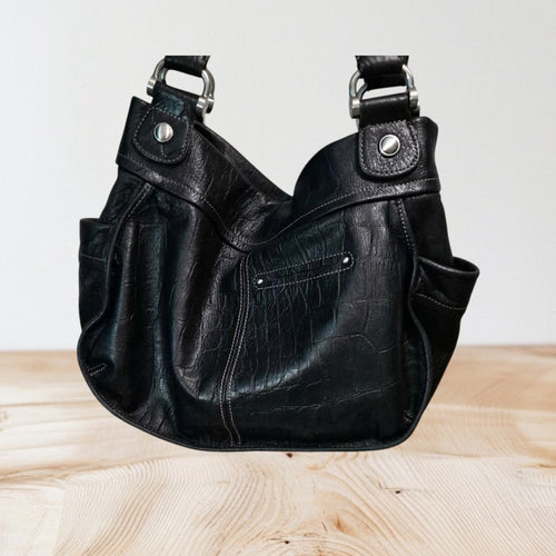 Marcia's Chic Boutique black crocodile-embossed faux leather hobo handbag with silver-tone hardware and shoulder strap.