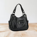 Marcia's Chic Boutique black faux leather crocodile embossed hobo handbag with silver hardware and side pockets.