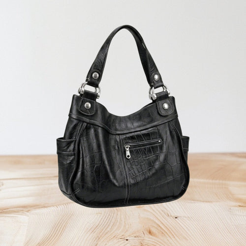 Marcia's Chic Boutique black faux leather crocodile embossed hobo handbag with silver hardware and side pockets.
