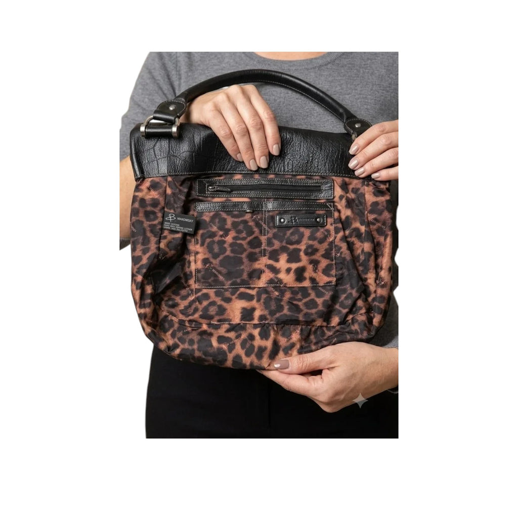 Marcia's Chic Boutique black crocodile embossed faux leather hobo bag with leopard print lining and silver hardware.