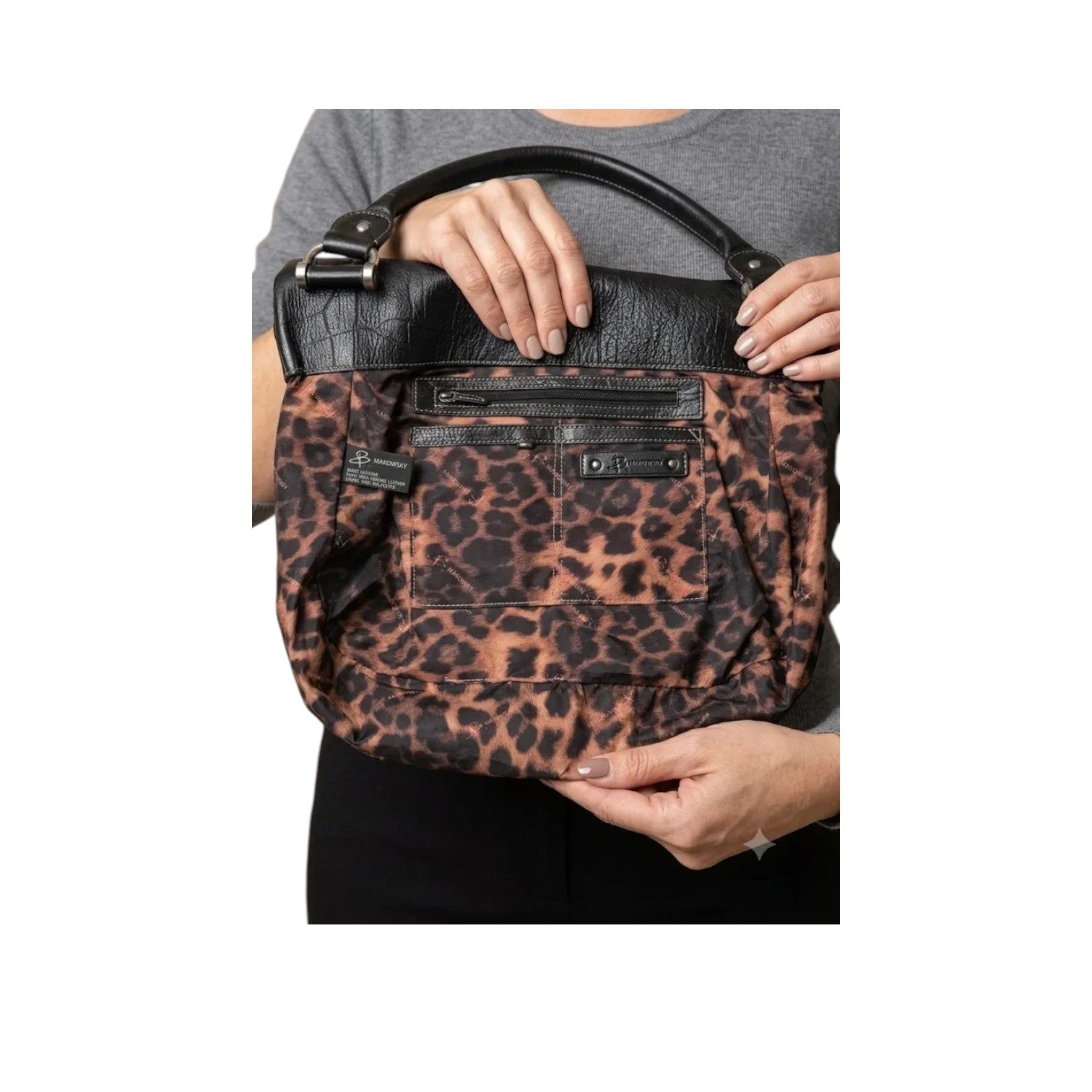 Marcia's Chic Boutique black crocodile embossed faux leather hobo bag with leopard print lining and silver hardware.